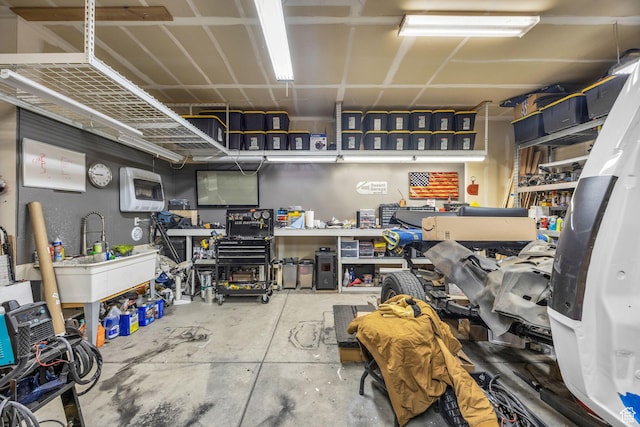 203 E Deer Run Loop Unit 40, Elk Ridge, UT 84651 - garage featuring a workshop area