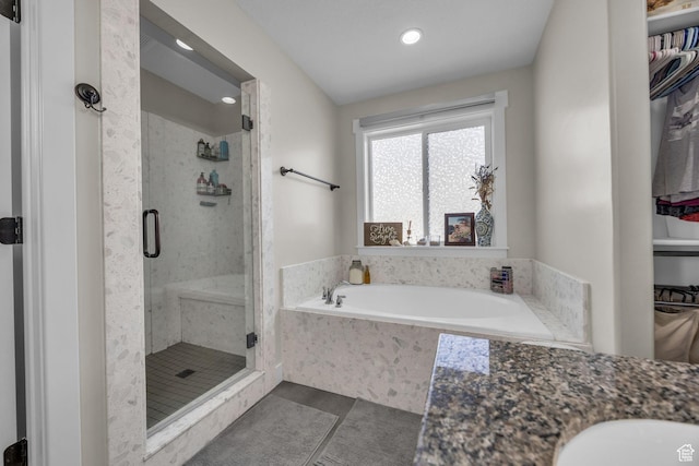 203 E Deer Run Loop Unit 40, Elk Ridge, UT 84651 - bathroom with a stall shower, a bath, recessed lighting, and a sink
