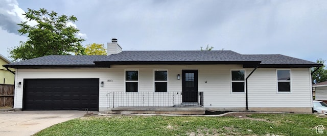 ranch-style home featuring driveway, a porch, a chimney, a front lawn, and a garage