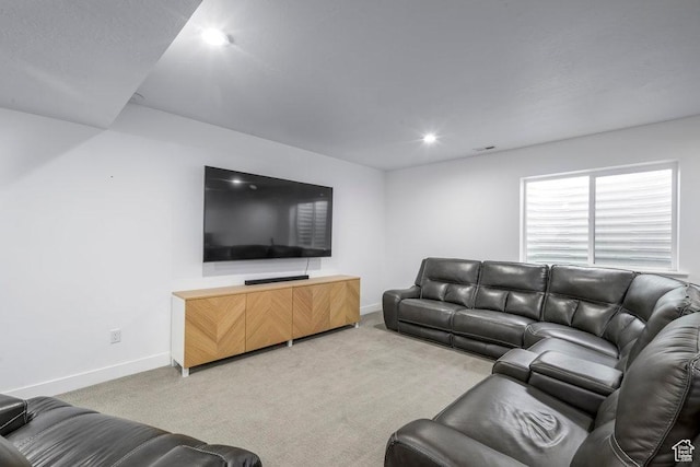 living area with light carpet, visible vents, recessed lighting, and baseboards