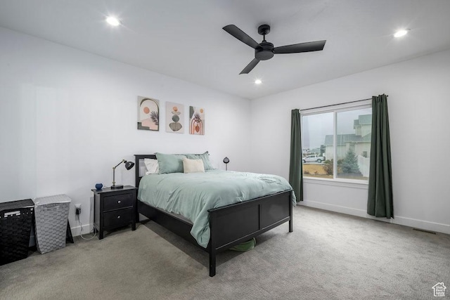 bedroom featuring a ceiling fan, recessed lighting, baseboards, and carpet floors