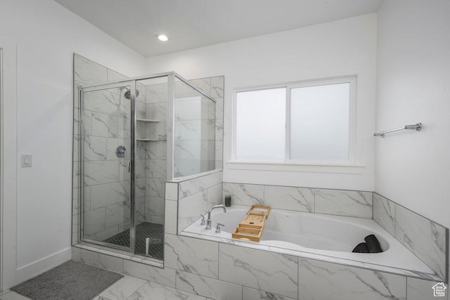 bathroom with recessed lighting, a marble finish shower, marble finish floor, and a bath