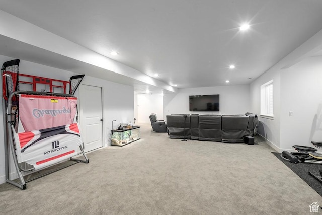 workout area featuring recessed lighting, baseboards, and carpet floors