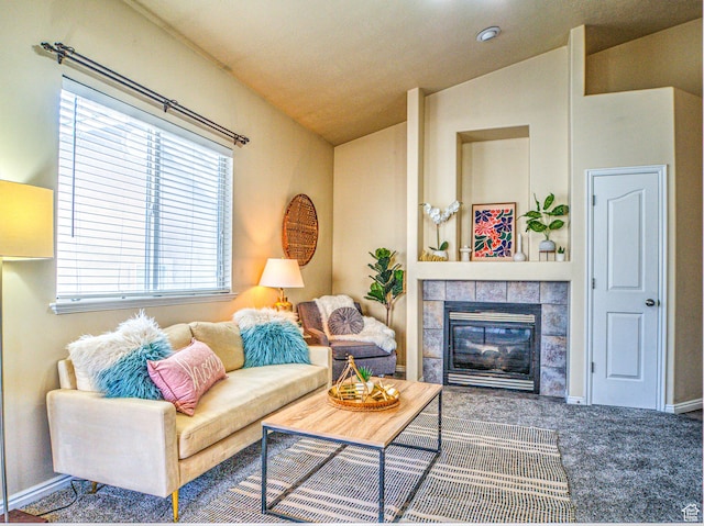 1464 W Duck Pond Ln, Taylorsville, UT 84123 - carpeted living area featuring vaulted ceiling, baseboards, and a tile fireplace