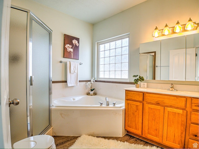 1464 W Duck Pond Ln, Taylorsville, UT 84123 - bathroom featuring vanity, a bath, and a stall shower