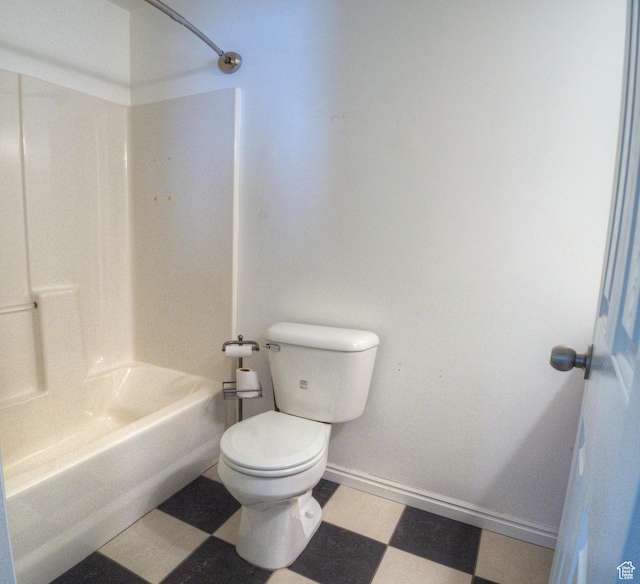 1464 W Duck Pond Ln, Taylorsville, UT 84123 - bathroom with tile patterned floors, tub / shower combination, toilet, and baseboards