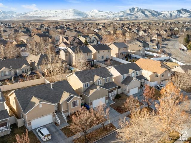 7009 W 7895 S, West Jordan, UT 84081 - birds eye view of property with a mountain view and a residential view