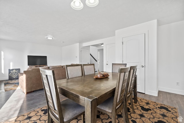 7009 W 7895 S, West Jordan, UT 84081 - dining space with dark wood-type flooring and baseboards