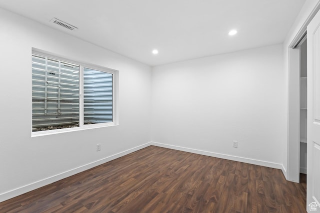 7009 W 7895 S, West Jordan, UT 84081 - unfurnished bedroom featuring visible vents, dark wood-type flooring, recessed lighting, a closet, and baseboards