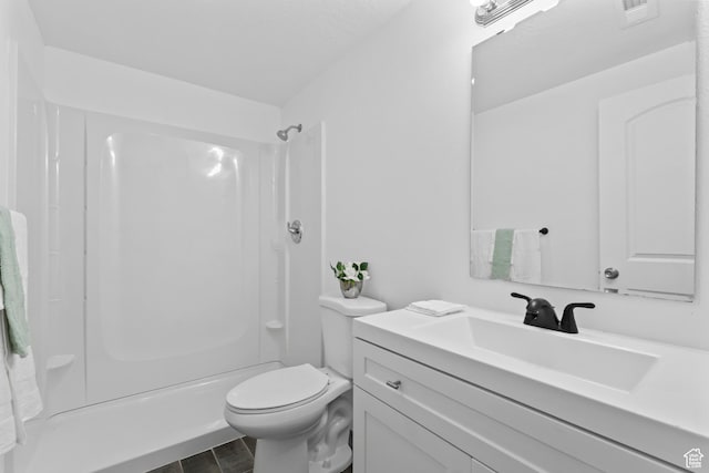 7009 W 7895 S, West Jordan, UT 84081 - full bathroom featuring visible vents, toilet, walk in shower, and vanity