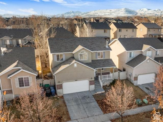 7009 W 7895 S, West Jordan, UT 84081 - drone / aerial view featuring a mountain view and a residential view