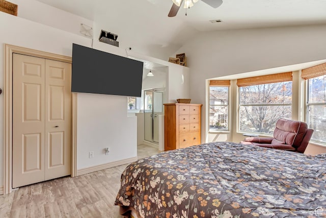bedroom featuring vaulted ceiling, ceiling fan, and visible vents