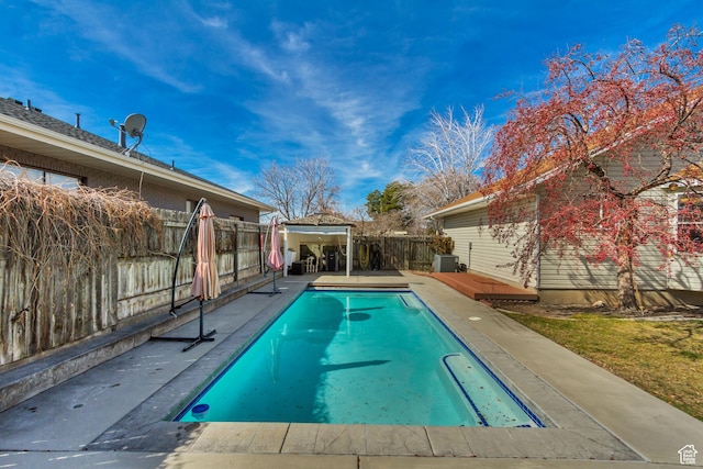 view of swimming pool featuring a fenced backyard, a gazebo, a patio, and a fenced in pool