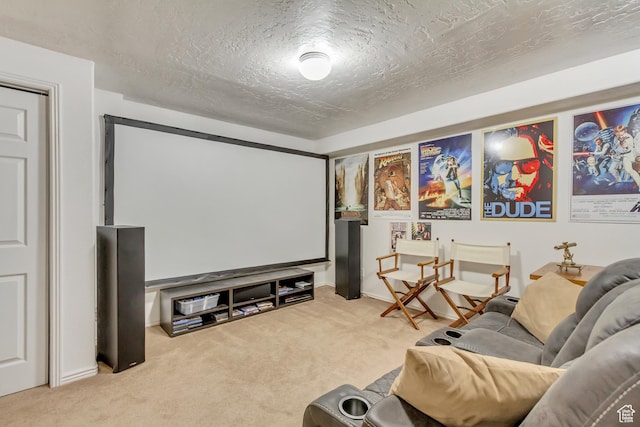 home theater featuring light carpet and a textured ceiling