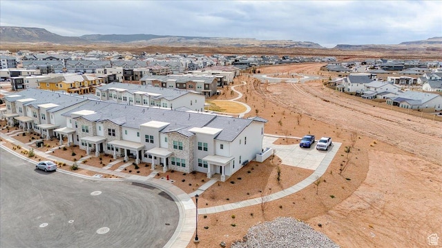 drone / aerial view with a residential view and a mountain view