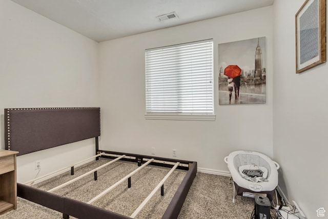 bedroom featuring carpet flooring, baseboards, and visible vents