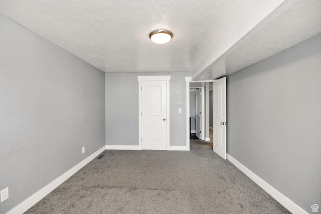 1170 N 730 E, Logan, UT 84341 - carpeted spare room featuring baseboards, a textured ceiling, and a textured wall