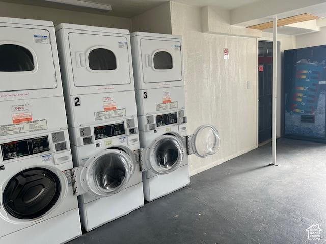 shared laundry area featuring independent washer and dryer and stacked washing maching and dryer