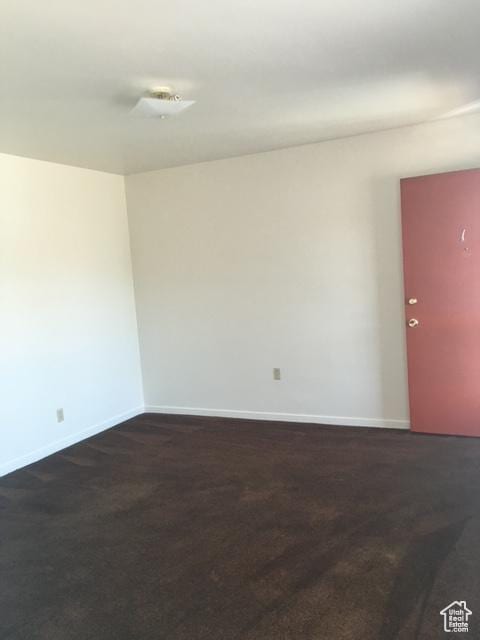 empty room with baseboards