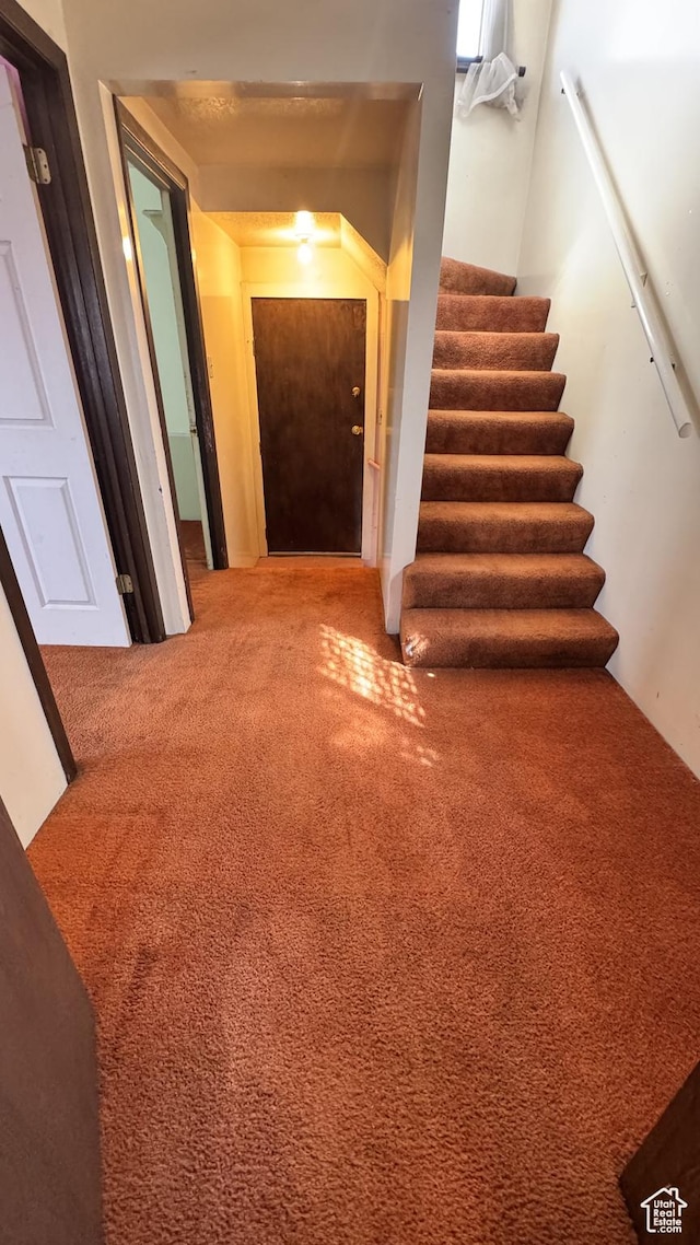 1010 Sullivan Rd, Ogden, UT 84403 - interior space featuring carpet flooring and stairs