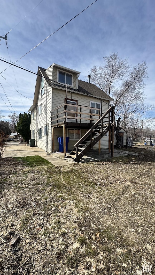 1010 Sullivan Rd, Ogden, UT 84403 - back of property featuring a deck and stairway