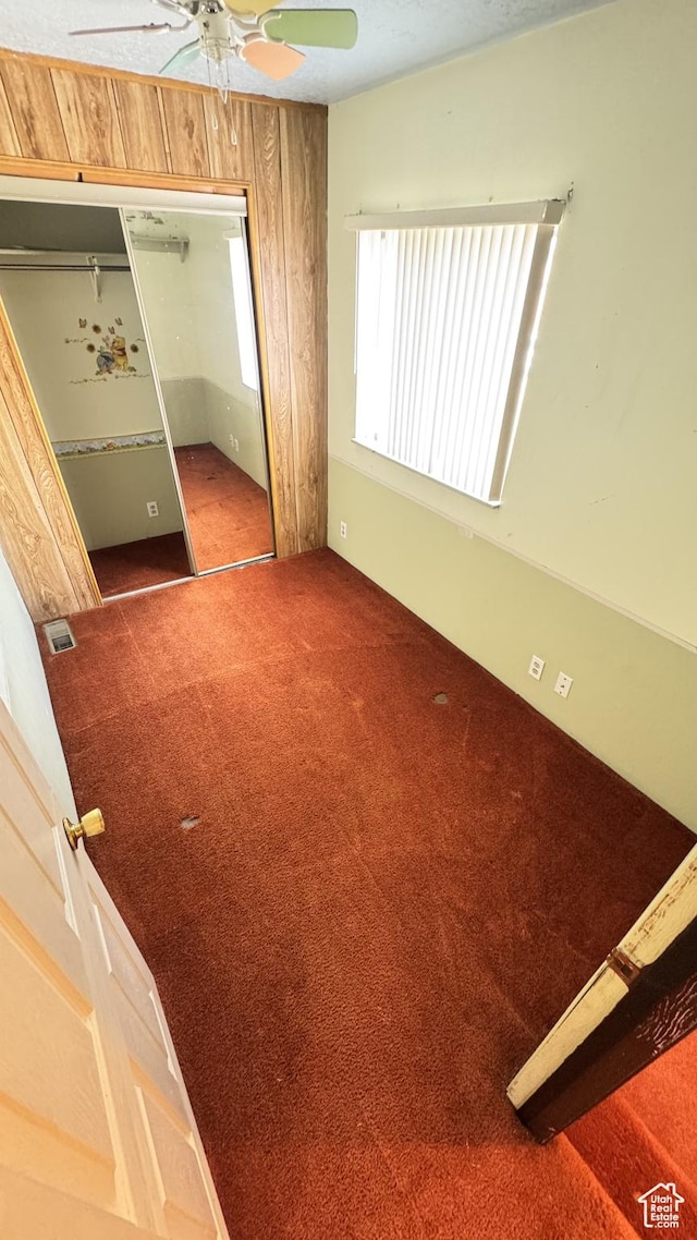 1010 Sullivan Rd, Ogden, UT 84403 - unfurnished bedroom featuring carpet, visible vents, a closet, and ceiling fan