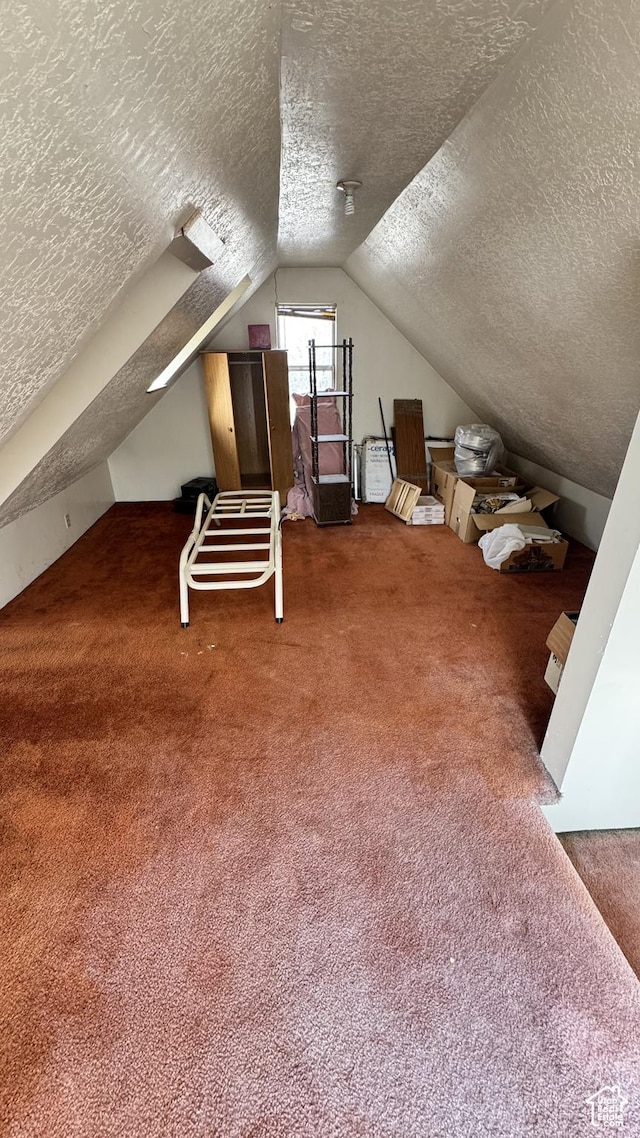 1010 Sullivan Rd, Ogden, UT 84403 - bonus room with carpet floors, a textured ceiling, and vaulted ceiling