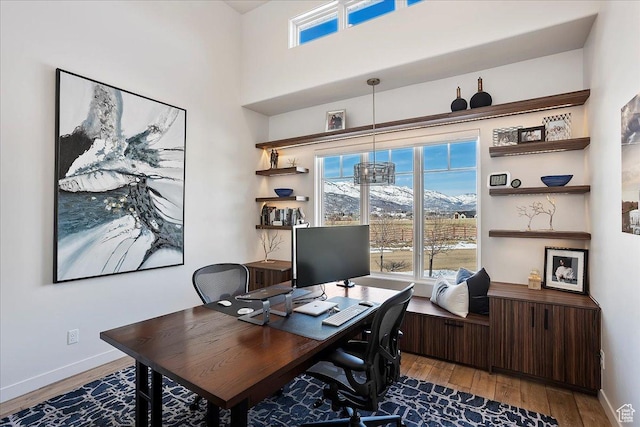 office with wood finished floors and baseboards