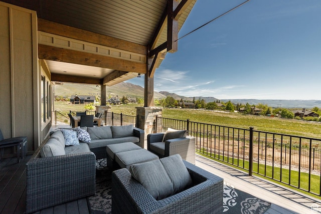 3651 N Eagle Ridge Dr E, Eden, UT 84310 - wooden deck featuring a mountain view and outdoor lounge area