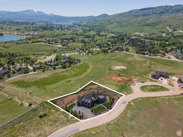 3651 N Eagle Ridge Dr E, Eden, UT 84310 - aerial overview of property's location with property parcel outlined and a water and mountain view
