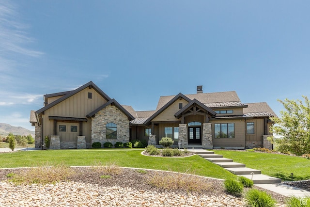 3651 N Eagle Ridge Dr E, Eden, UT 84310 - craftsman-style house featuring board and batten siding, stone siding, and a standing seam roof
