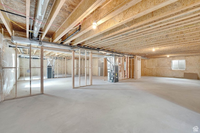 basement featuring heating unit