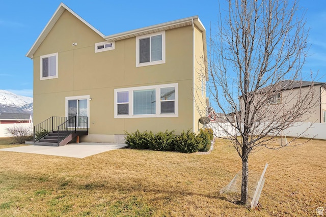 621 E Mayor Place Dr S, American Fork, UT 84003 - rear view of house featuring a patio, a yard, and stucco siding