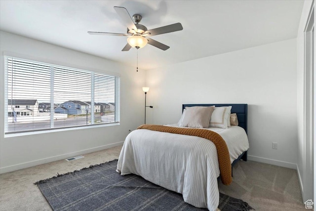 987 S 950 W, American Fork, UT 84003 - bedroom with visible vents, a ceiling fan, baseboards, and dark colored carpet