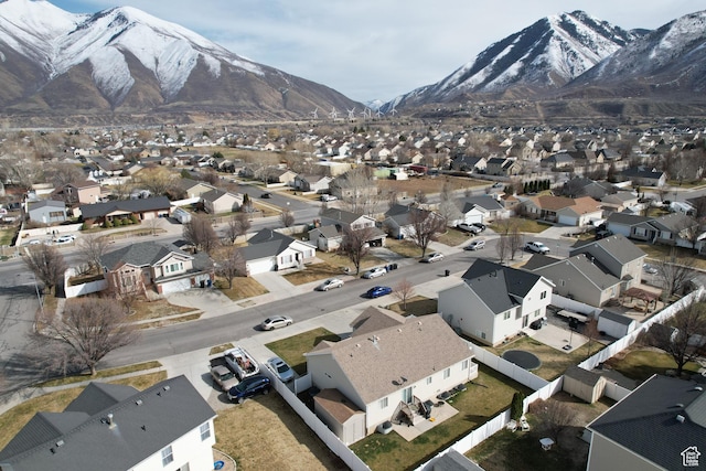aerial view featuring a mountain view and a residential view