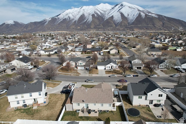 aerial view featuring a mountain view and a residential view