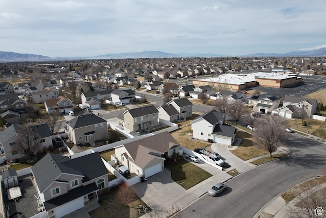aerial view featuring a mountain view and a residential view