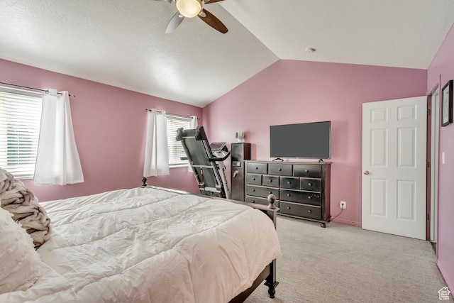 bedroom featuring carpet, a ceiling fan, and vaulted ceiling