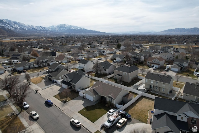 drone / aerial view featuring a mountain view and a residential view
