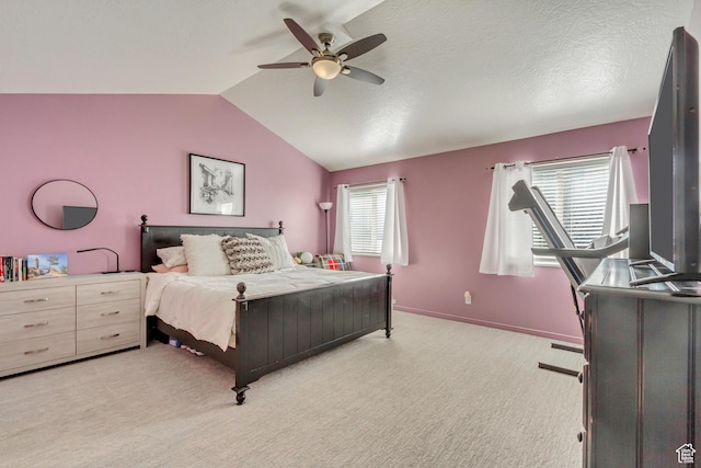 bedroom featuring baseboards, multiple windows, lofted ceiling, and light carpet