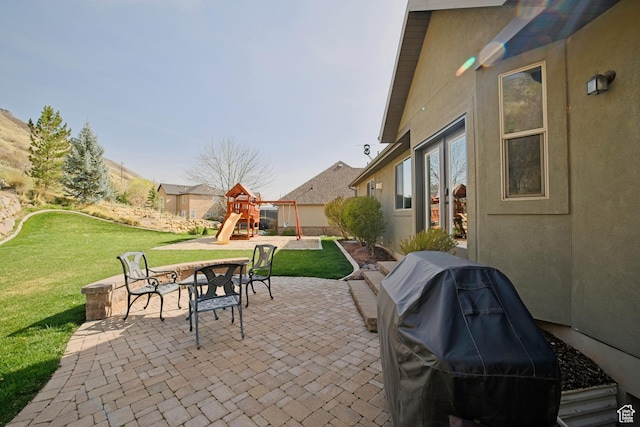 406 N 1420 E, Provo, UT 84606 - view of patio with french doors, grilling area, and a playground