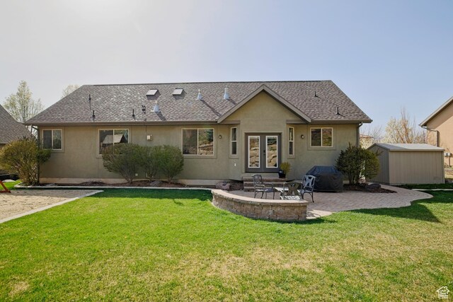 406 N 1420 E, Provo, UT 84606 - back of property with a patio, stucco siding, an outdoor structure, french doors, and a lawn