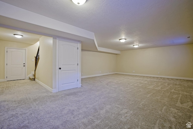 406 N 1420 E, Provo, UT 84606 - finished basement with a textured ceiling, light colored carpet, and baseboards
