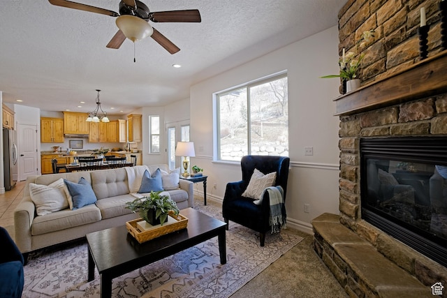 406 N 1420 E, Provo, UT 84606 - living area featuring light carpet, a fireplace, recessed lighting, a textured ceiling, and ceiling fan with notable chandelier