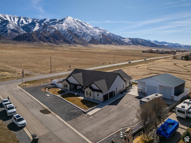 aerial view featuring a mountain view and a rural view
