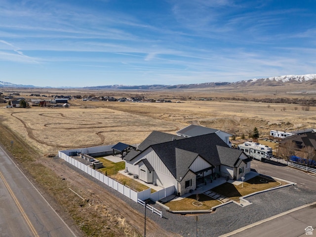 drone / aerial view featuring a mountain view