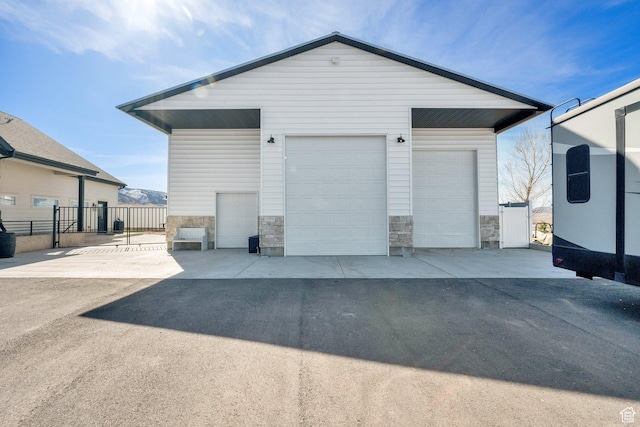 detached garage with fence