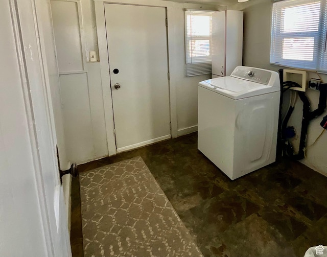 laundry room with laundry area, plenty of natural light, and washer / clothes dryer