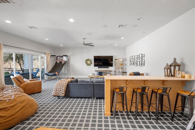 2917 S Old Farm Rd, Washington, UT 84780 - living room featuring recessed lighting, carpet, visible vents, and a ceiling fan
