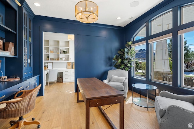 2917 S Old Farm Rd, Washington, UT 84780 - office with light wood-style flooring, a wealth of natural light, and a chandelier
